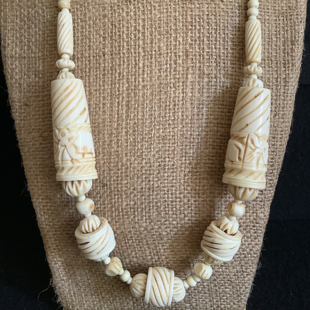 Vintage hand carved bone necklace.